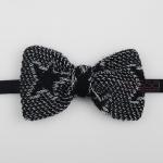 Knitted bow tie in star pat..