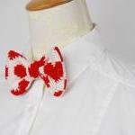 Knitted bow tie in heart pa..