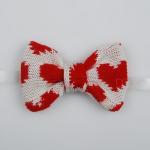 Knitted bow tie in heart pa..